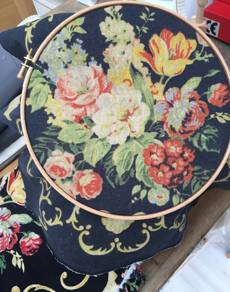 Embroidering a printed cloth