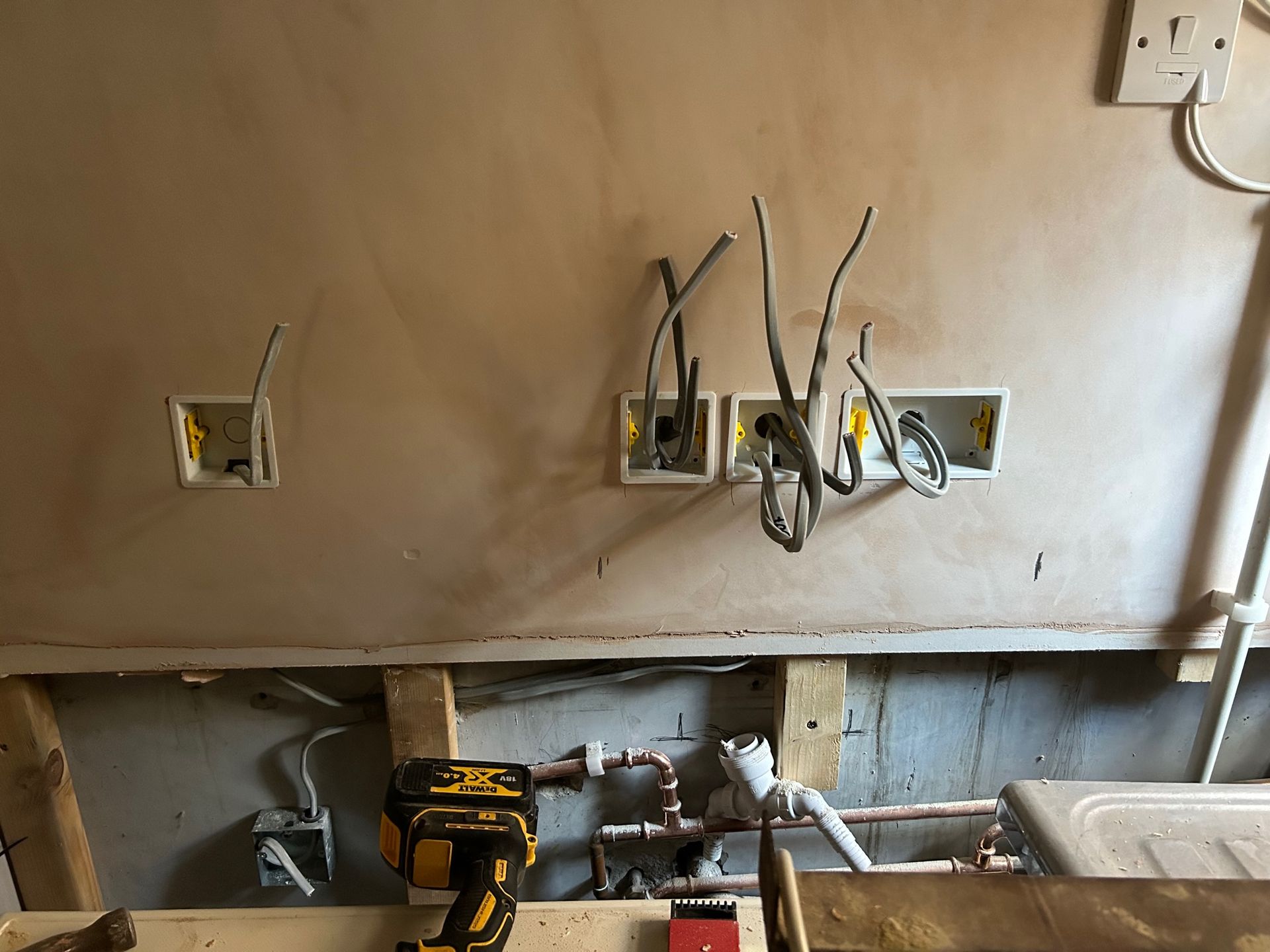 repositioning of plug socket for a residential property in East Grinstead, West Susse