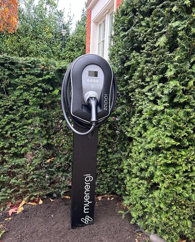 Installation of a My Energi Zappi Pedestal in black at a domestic property in East Grinstead, West Sussex.