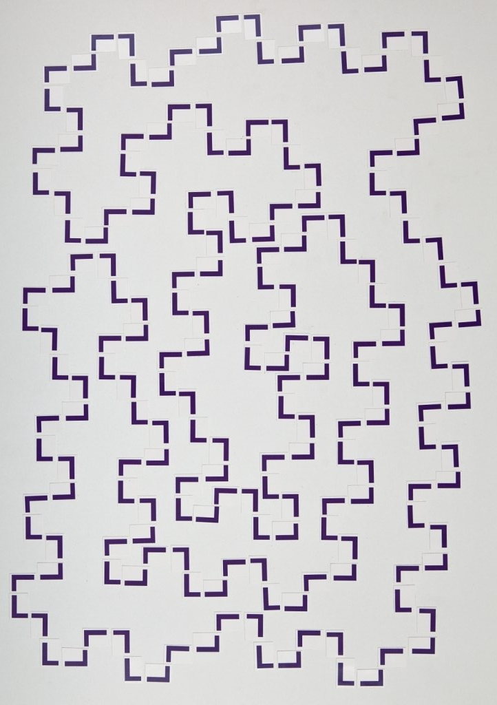 Buchstabencollage aus dem lilafarbenen Buchstaben I und N von Carsten Schneider