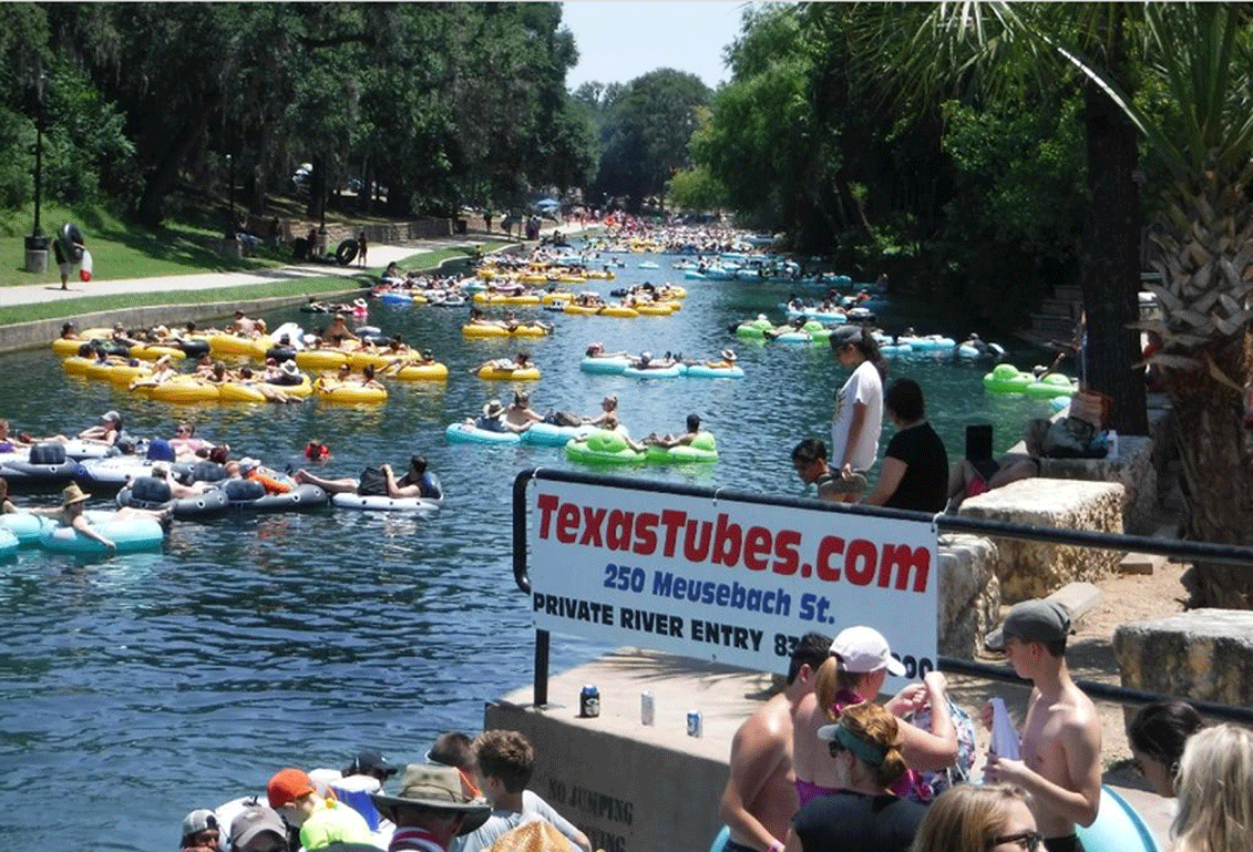 A view from the Texas Tubes' Webcam of hundreds of people Tubing down the Comal River in New Braunfels, TX