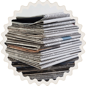 Das Bild beinhaltet einen Stapel Zeitungen