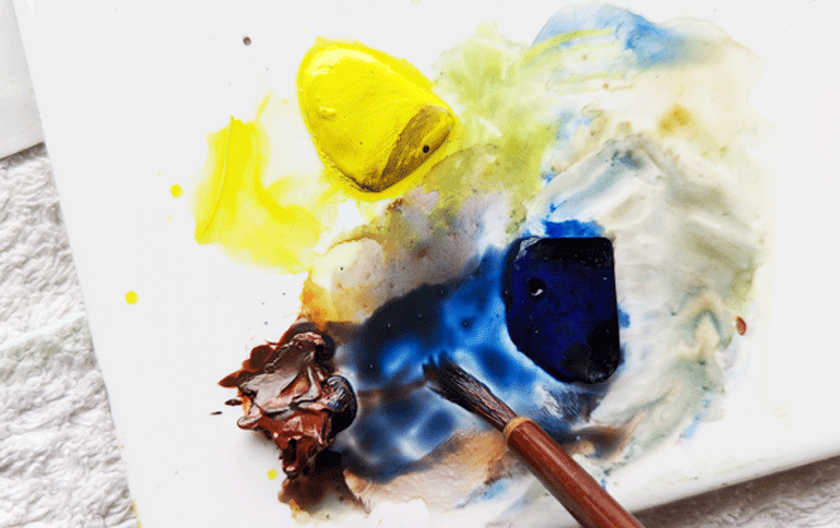 Mixing black to paint the pencil drawn Puffin design from the A J Ludlow Watercolour Painting sets