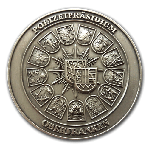 Die Fa. Schwemmlein aus Bayreuth, der führende Hersteller von Münzen, und Medaillen für Organisationen wie Polizei, Bundespolizei, Zoll, THW, RRK, Malteser, AWO uvm, individuell gefertigt nach Kundenvorlage, Motive oder Wappen.